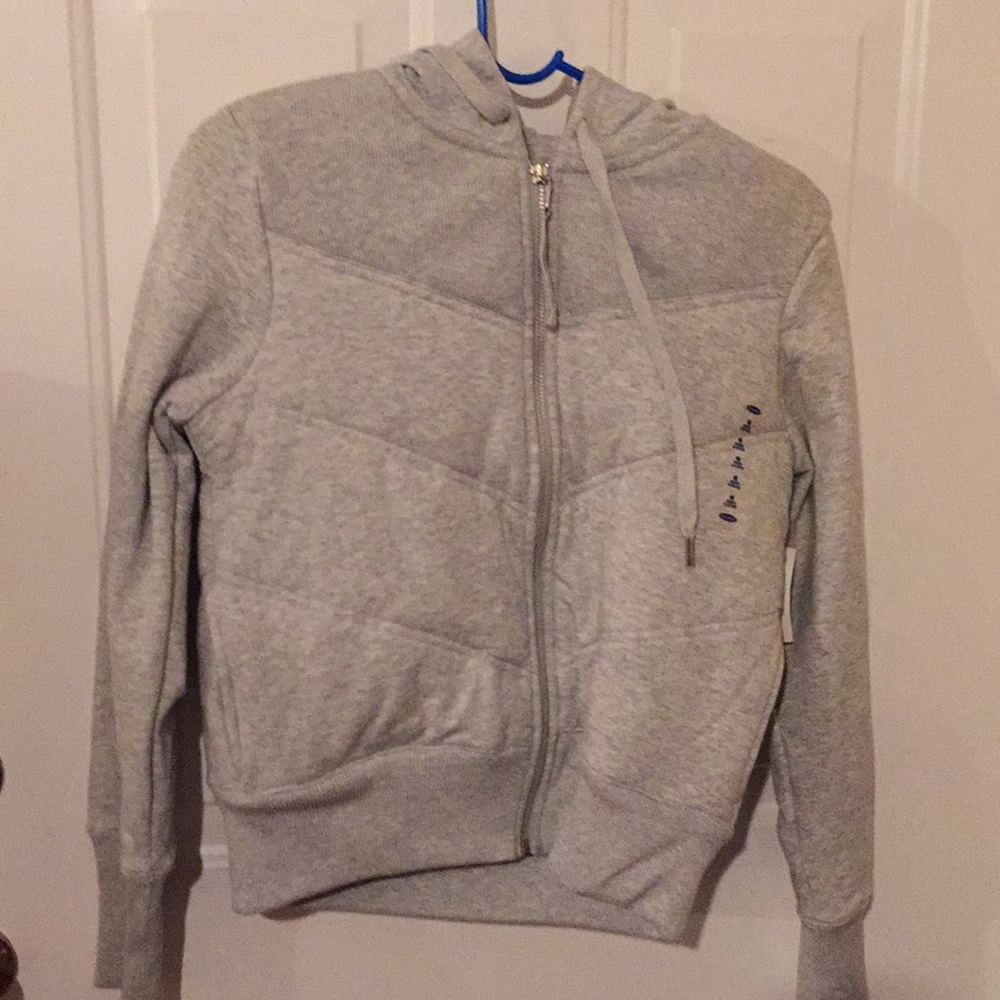 Grey insulated vest with sleeves